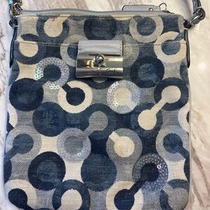 Coach  Crossbody, C pattern denim design with blue leather strap.